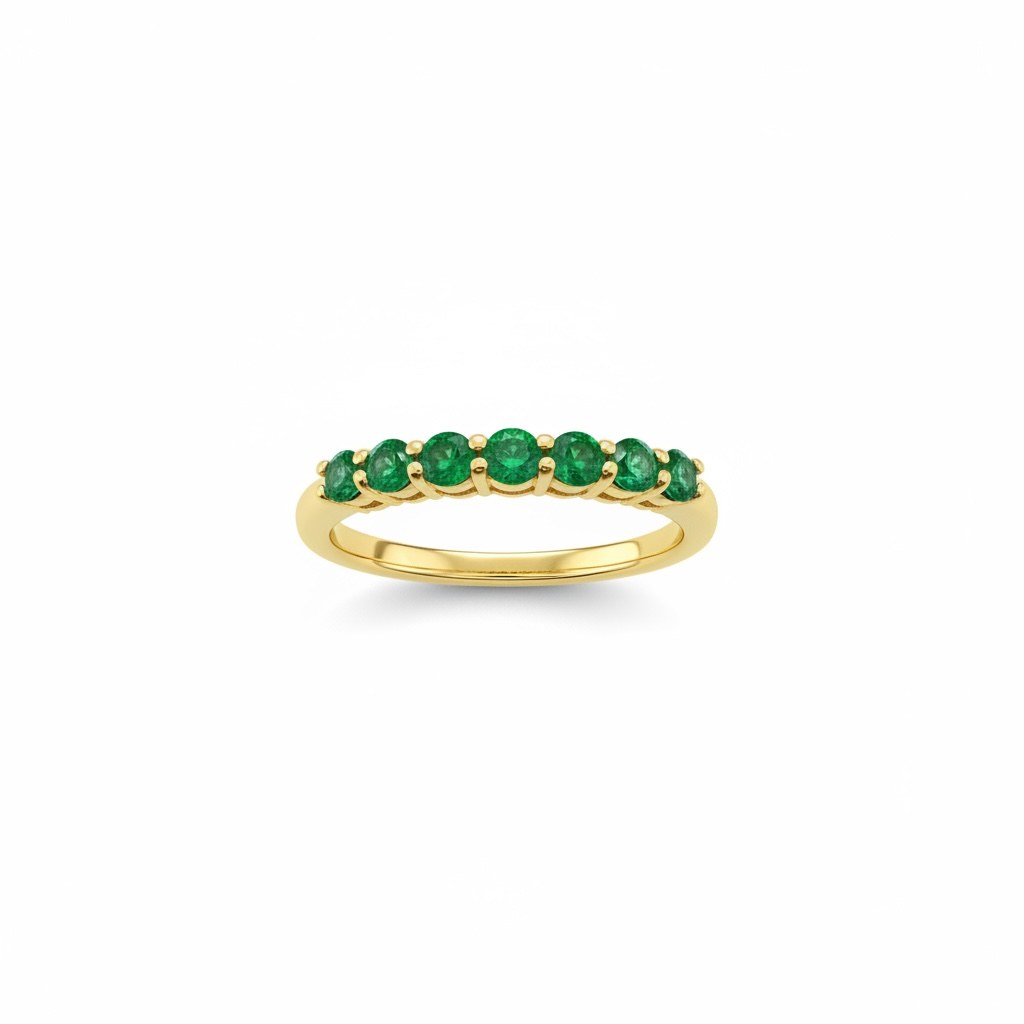 Media churumbela de esmeraldas en oro amarillo 14k