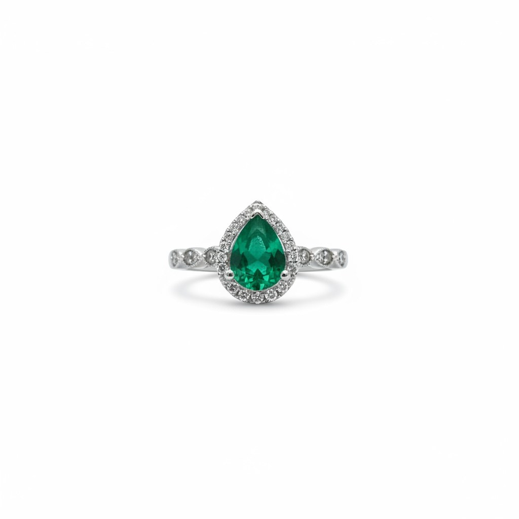 Anillo de esmeralda en gota con diamantes