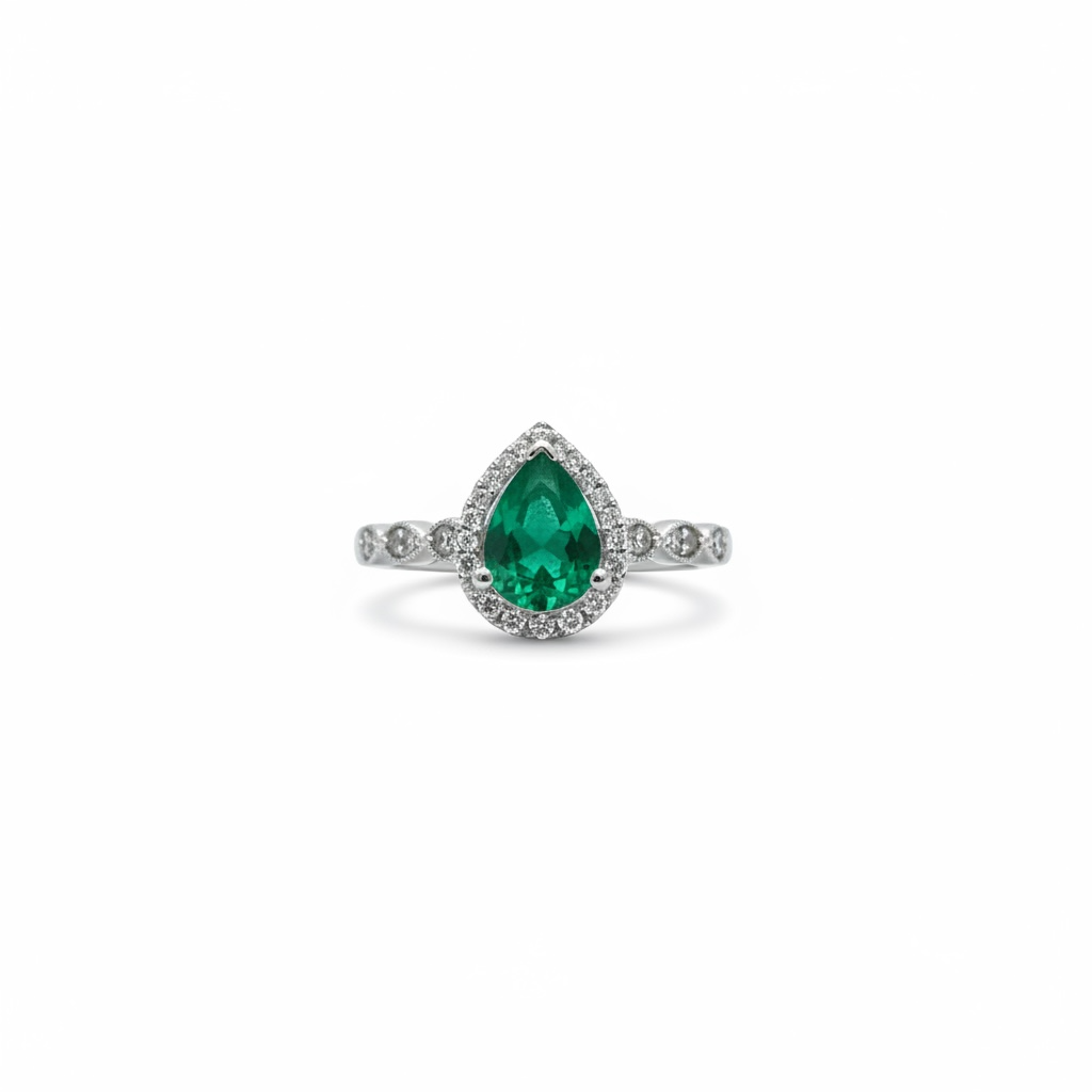 Anillo de esmeralda en gota con diamantes