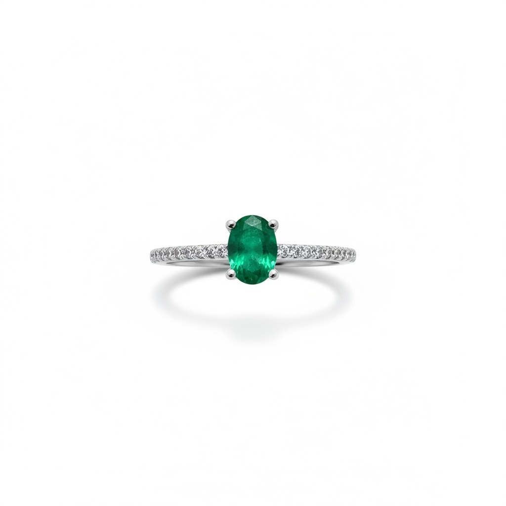 Anillo de esmeralda oval con media churumbela de diamantes en oro blanco 14k